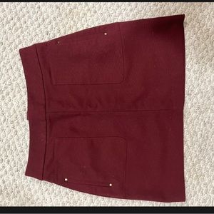 Burgundy mini skirt with gold detail